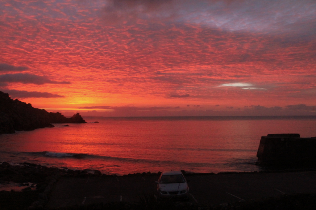 Sunrise from the bedroom window at Cove House self catering holiday home in west Cornwall.