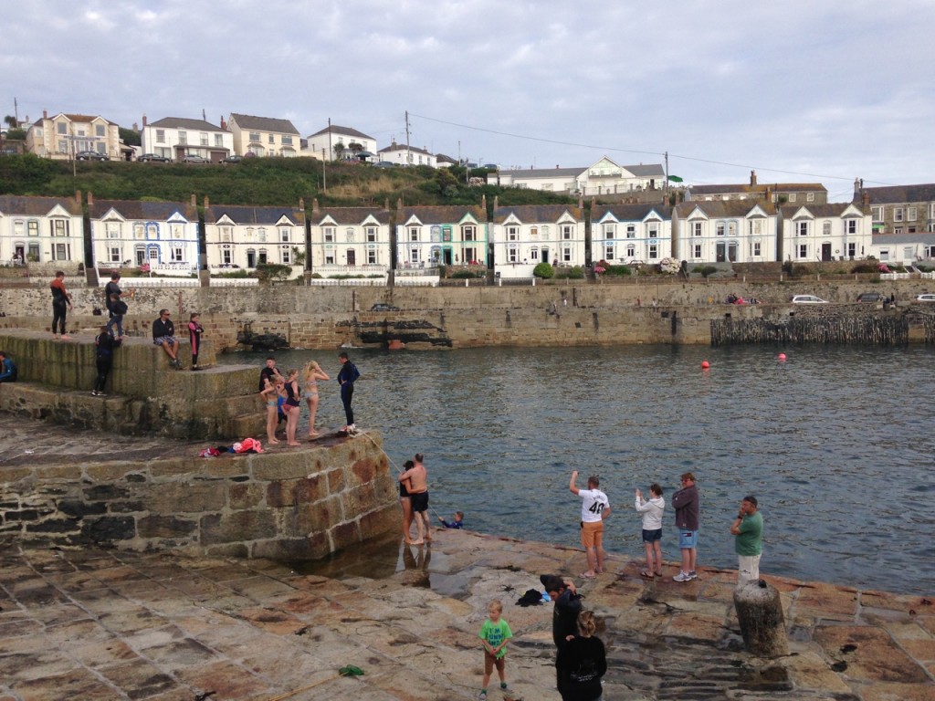 Divers on the harbour walls.