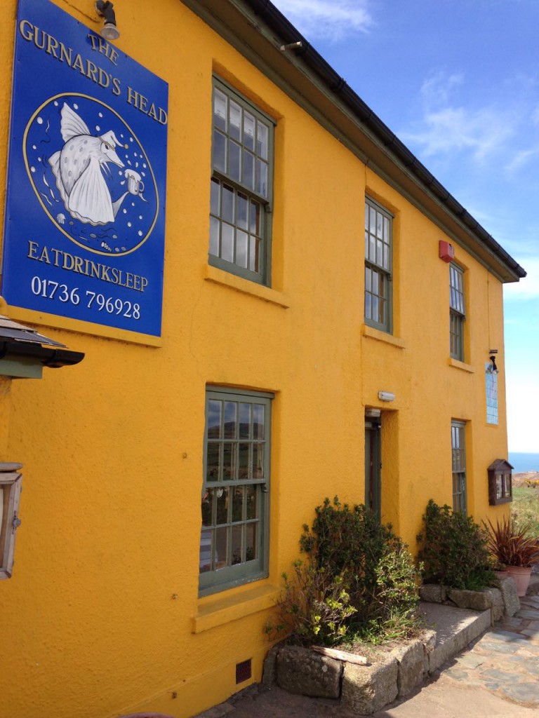 And the rather yellow The Gurnard's Head pub and hotel.