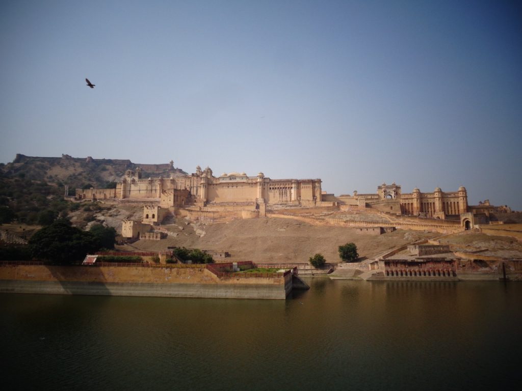 The Amer / Amber Fort from across one of its reservoirs.